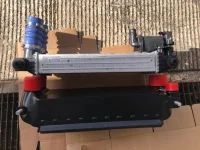 Mishimoto Intercooler and OEM intercooler 2.webp