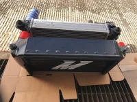 Mishimoto Intercooler and OEM intercooler 3.webp