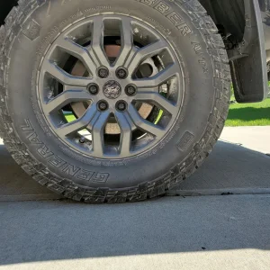 Lug nuts and valve stem cap.jpg
