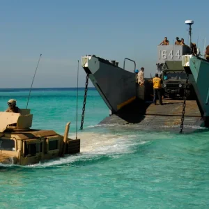 US_Navy_111114-N-KA046-134_A_Humvee_launches_from_a_landing_craft_utility_(LCU)_assigned_to_t...webp