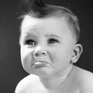 1940s-sad-baby-with-pouting-lower-lip-vintage-images.jpg